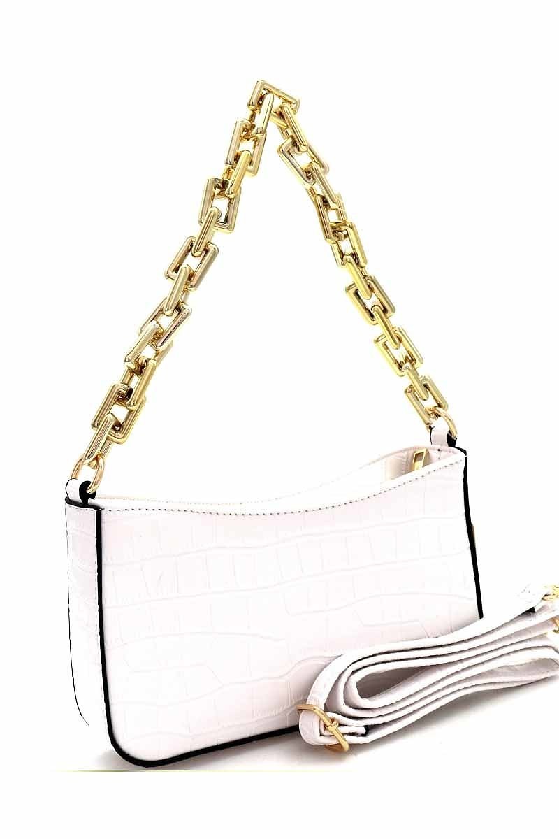 "Casual" HandbagThis handbag is a fashionable accessory, designed with a casual look. It features a unique combination of stylish design and practical construction, ideal for everydHandbagsK Monae'sK Monae's"Casual" Handbag
