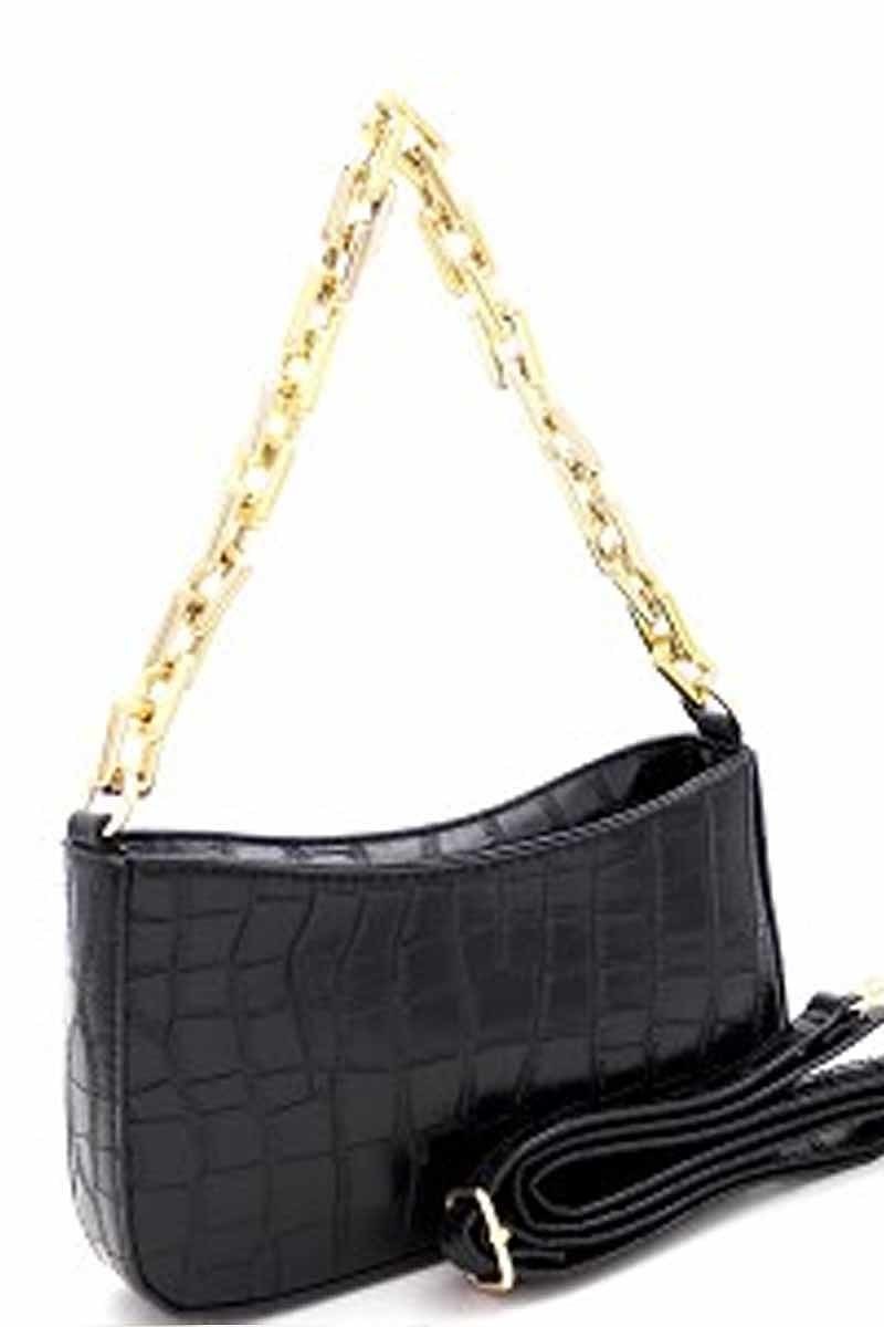 "Casual" HandbagThis handbag is a fashionable accessory, designed with a casual look. It features a unique combination of stylish design and practical construction, ideal for everydHandbagsK Monae'sK Monae's"Casual" Handbag