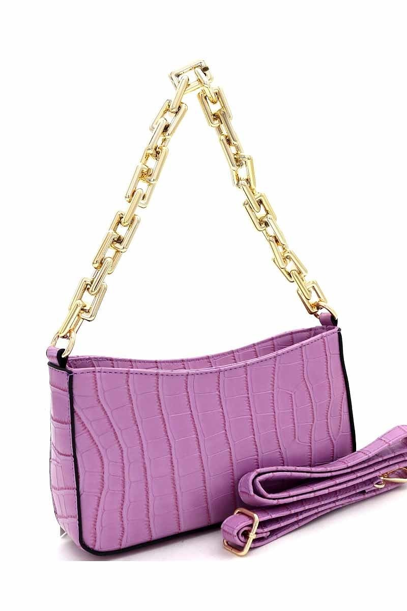 "Casual" HandbagThis handbag is a fashionable accessory, designed with a casual look. It features a unique combination of stylish design and practical construction, ideal for everydHandbagsK Monae'sK Monae's"Casual" Handbag