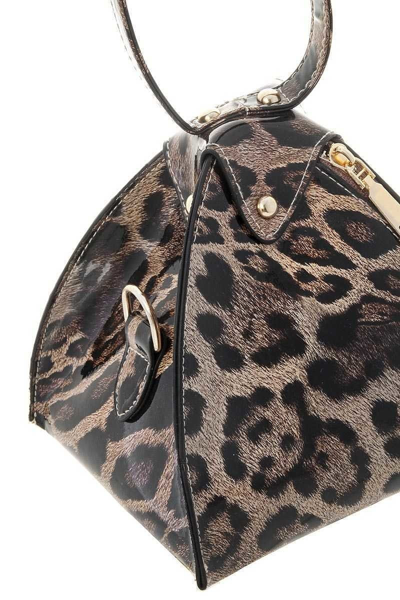 "Hold it" HandbagThis sleek wristlet is designed in a 3D triangular shape that catches the eye with its iridescent color. Perfect for any occasion, this small accessory adds a touch HandbagsK Monae'sK Monae's"Hold