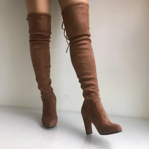 "Diva" BootsExperience the luxurious feel of faux suede with our "Diva" Boots. These thigh high boots feature a stylish chunky heel, perfect for making a statement. Keep in mindBootsK Monae'sK Monae's"Diva" Boots