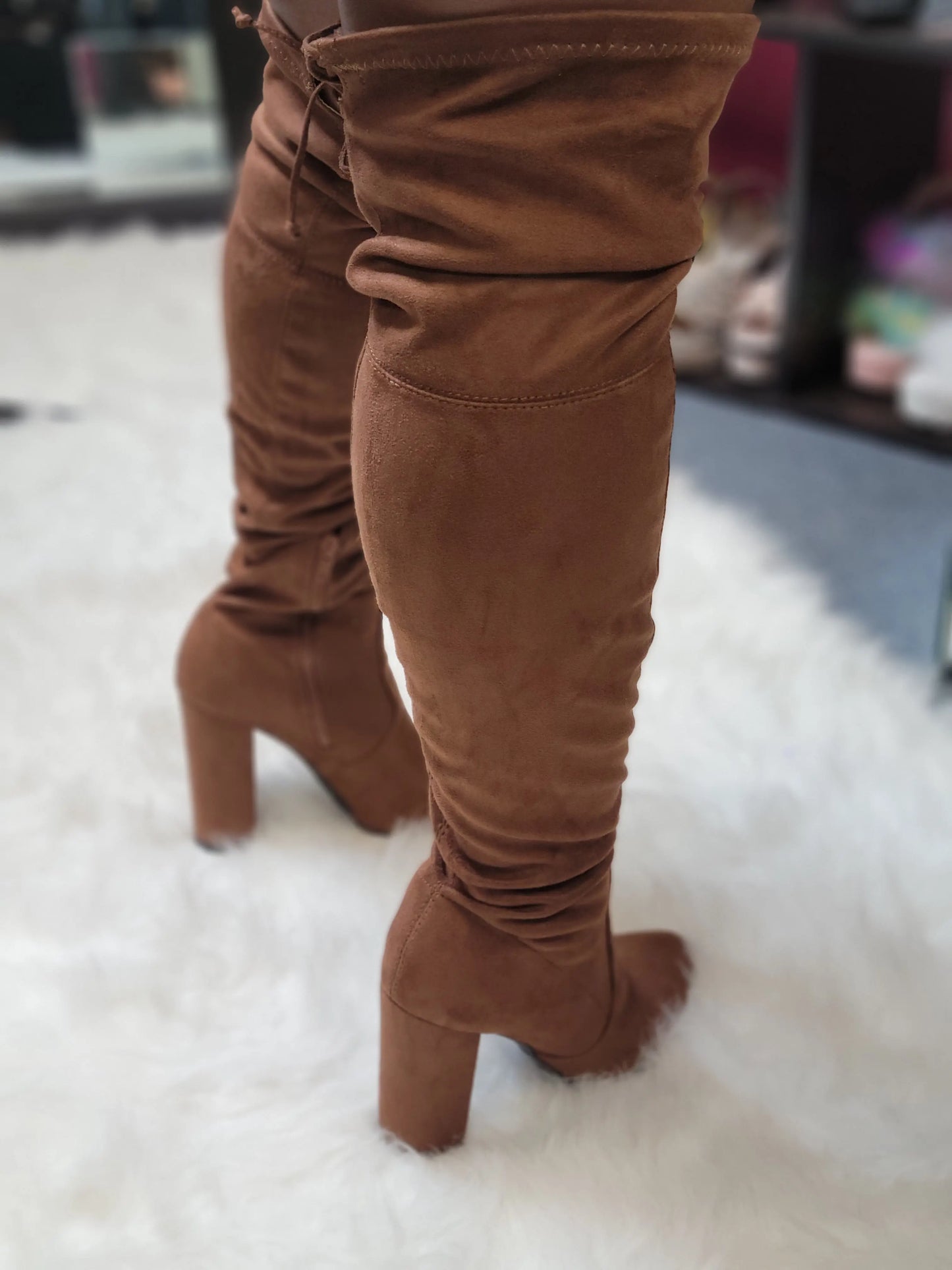 "Diva" BootsExperience the luxurious feel of faux suede with our "Diva" Boots. These thigh high boots feature a stylish chunky heel, perfect for making a statement. Keep in mindBootsK Monae'sK Monae's"Diva" Boots