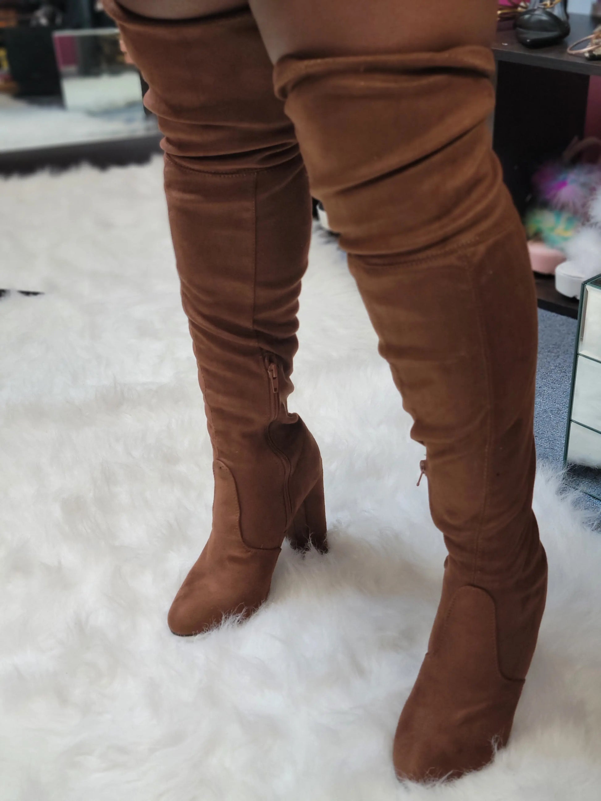 "Diva" BootsExperience the luxurious feel of faux suede with our "Diva" Boots. These thigh high boots feature a stylish chunky heel, perfect for making a statement. Keep in mindBootsK Monae'sK Monae's"Diva" Boots