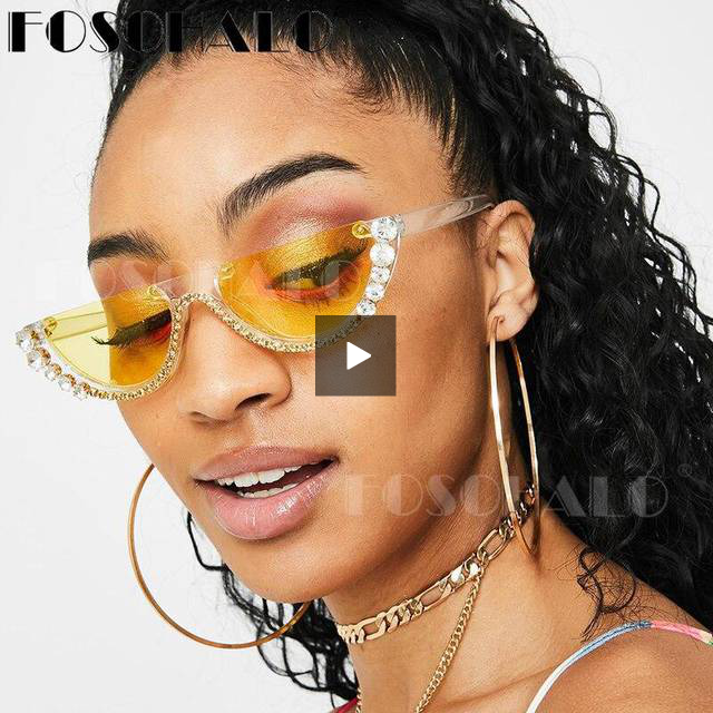 "Supa Flyy" SunglassesHalf round sunglasses.
Diamonds around the rim.
Cute.sunglassesK Monae'sK Monae's"Supa Flyy" Sunglasses