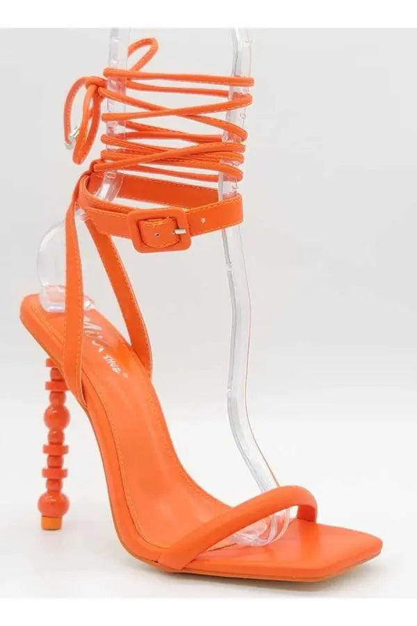 "Rip IT" HeelOrange corkscrew heel.
Strap up the leg.
True to size.ShoesK Monae'sK Monae's"Rip