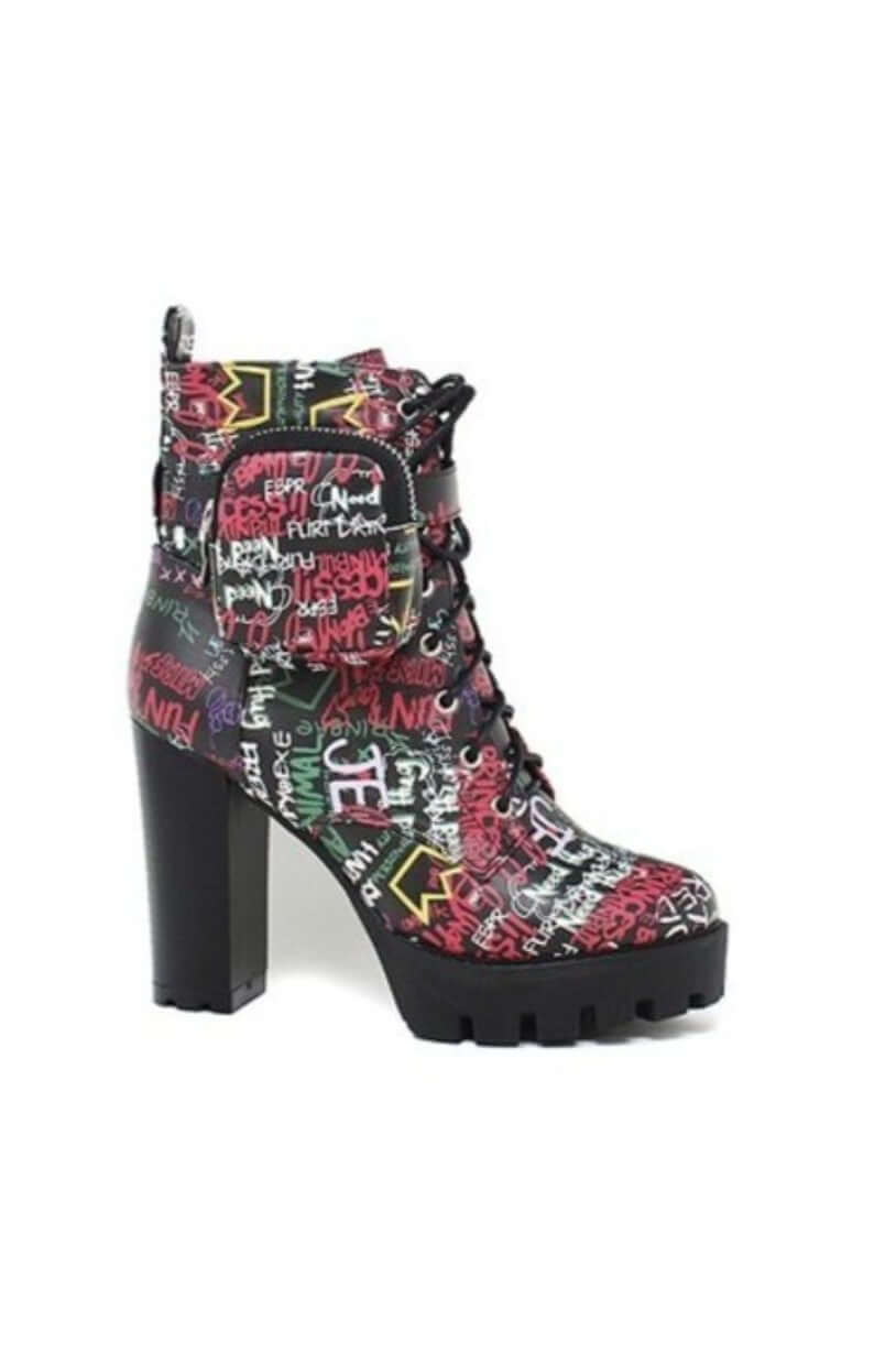 "Bad Girl" BootieChunky-heeled bootie with graffiti print; true to size, accommodates larger legs; model wears size 9BootsK Monae'sK Monae's"Bad Girl" Bootie