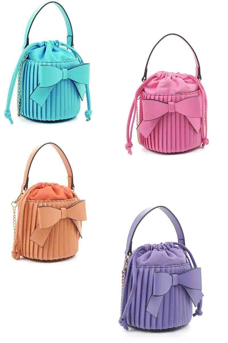 "Bucket List" HandbagThis classic round bucket purse offers ample capacity for today's modern woman. Its average size is perfect for day-to-day use.HandbagsK Monae'sK Monae's"Bucket List" Handbag