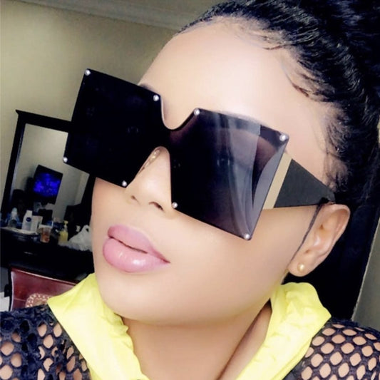 "Take me Back" SunglassesTransform your look with these stylish oversized sunglasses. Featuring wide frames, these sunglasses exude a bossy and confident vibe, making you stand out from the sunglassesK Monae'sK Monae'sBack" Sunglasses