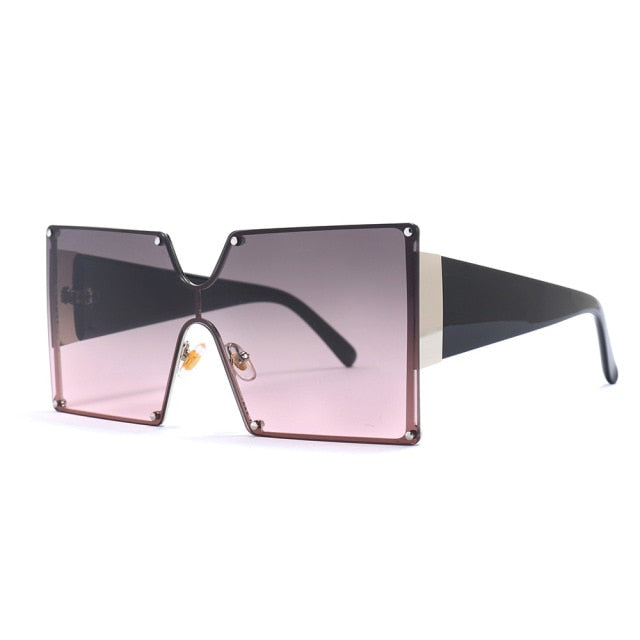 "Take me Back" SunglassesTransform your look with these stylish oversized sunglasses. Featuring wide frames, these sunglasses exude a bossy and confident vibe, making you stand out from the sunglassesK Monae'sK Monae'sBack" Sunglasses