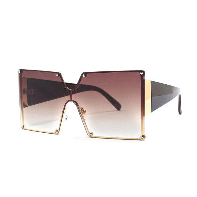 "Take me Back" SunglassesTransform your look with these stylish oversized sunglasses. Featuring wide frames, these sunglasses exude a bossy and confident vibe, making you stand out from the sunglassesK Monae'sK Monae'sBack" Sunglasses