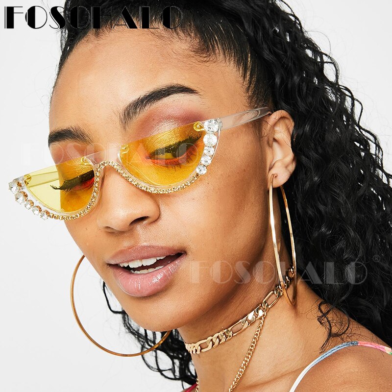 "Supa Flyy" SunglassesHalf round sunglasses.
Diamonds around the rim.
Cute.sunglassesK Monae'sK Monae's"Supa Flyy" Sunglasses