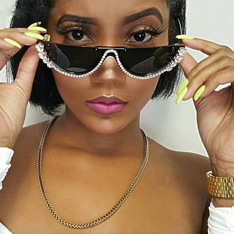 "Supa Flyy" SunglassesHalf round sunglasses.
Diamonds around the rim.
Cute.sunglassesK Monae'sK Monae's"Supa Flyy" Sunglasses