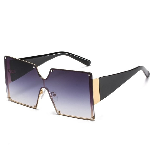 "Take me Back" SunglassesTransform your look with these stylish oversized sunglasses. Featuring wide frames, these sunglasses exude a bossy and confident vibe, making you stand out from the sunglassesK Monae'sK Monae'sBack" Sunglasses