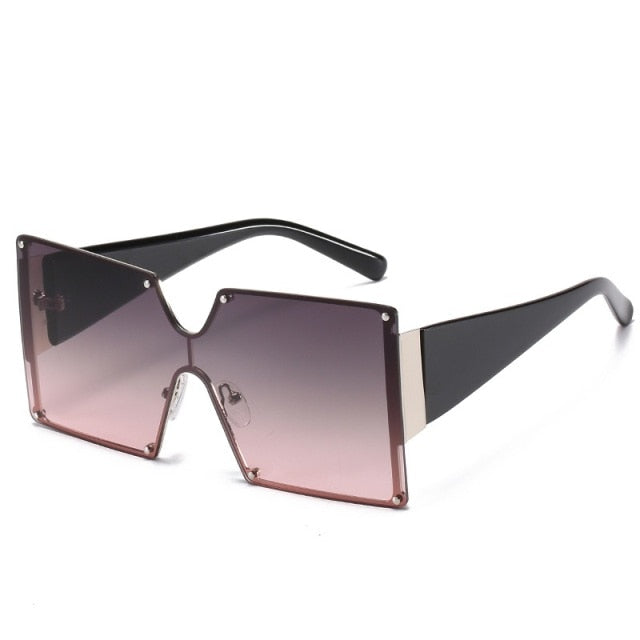 "Take me Back" SunglassesTransform your look with these stylish oversized sunglasses. Featuring wide frames, these sunglasses exude a bossy and confident vibe, making you stand out from the sunglassesK Monae'sK Monae'sBack" Sunglasses