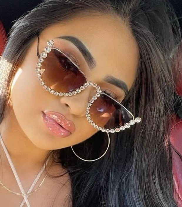 "Dymond" SunglassesSunglasses with diamonds around the rim.
Stylish for any occasion.
Fits any face.sunglassesK Monae'sK Monae's"Dymond" Sunglasses